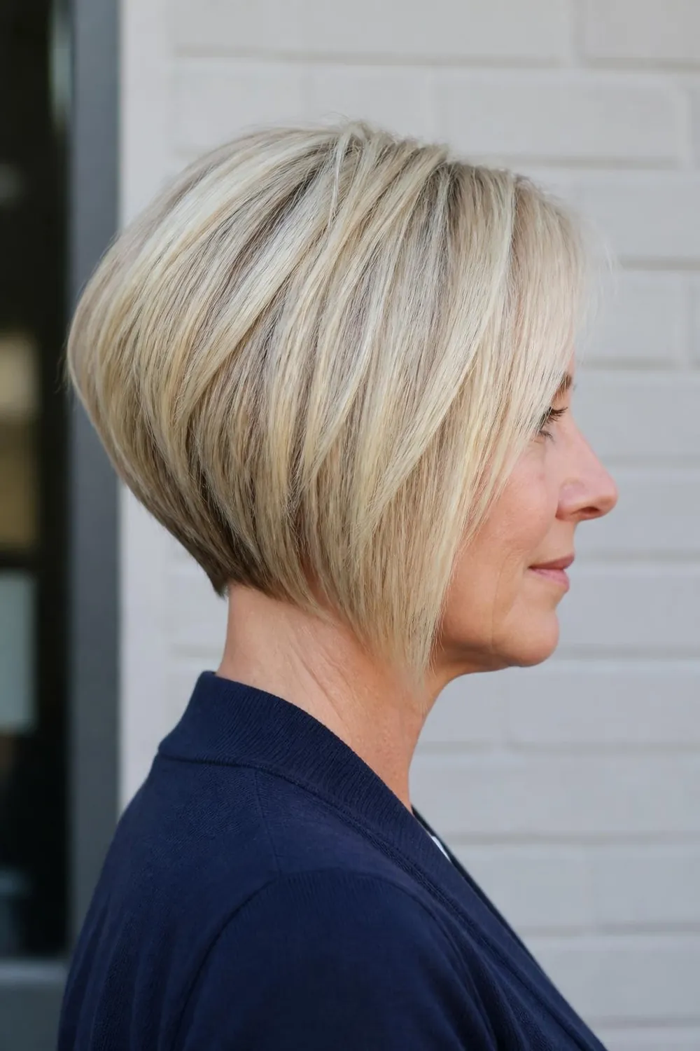 Stacked bob with a short graduated back and crown lift for thin hair over 50