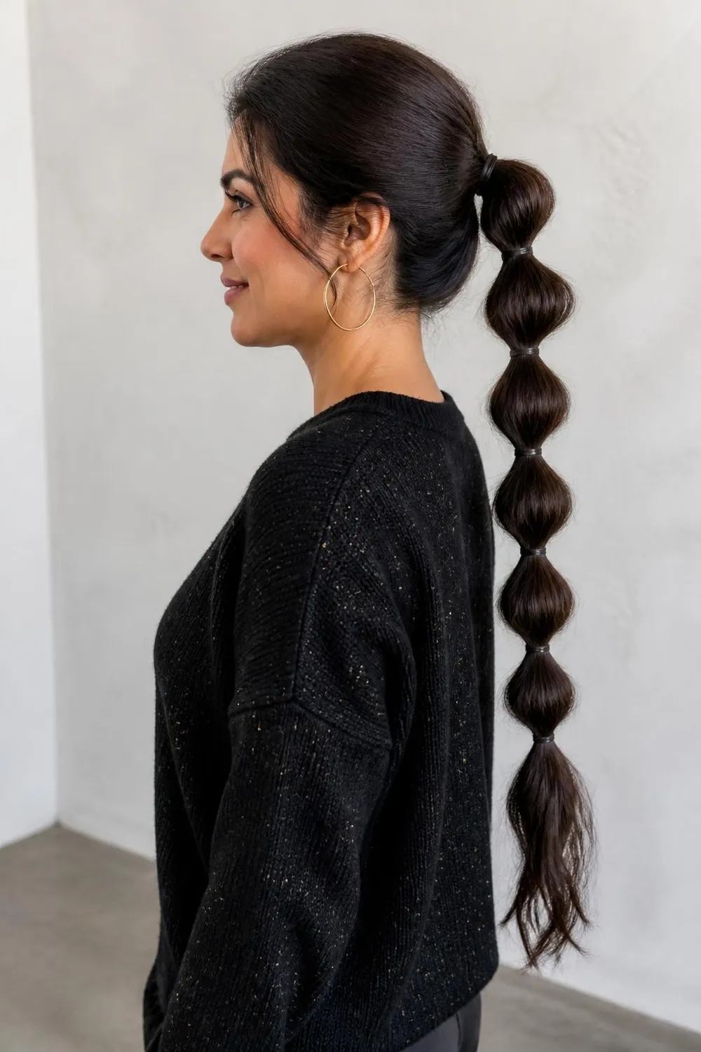 Pull-through faux braid ponytail on medium to long hair