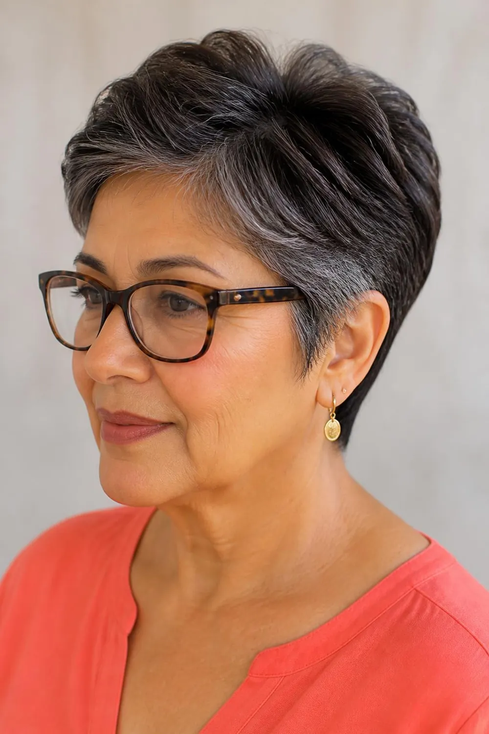 Soft pixie with tuck-behind sides for women over 60 who wear glasses