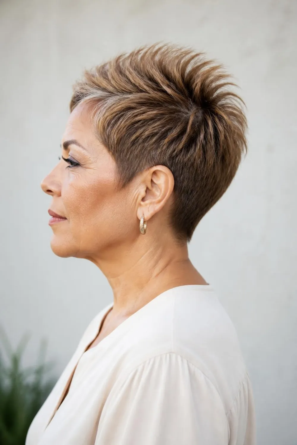 Pixie with a lifted crown and short sides for thin hair over 50