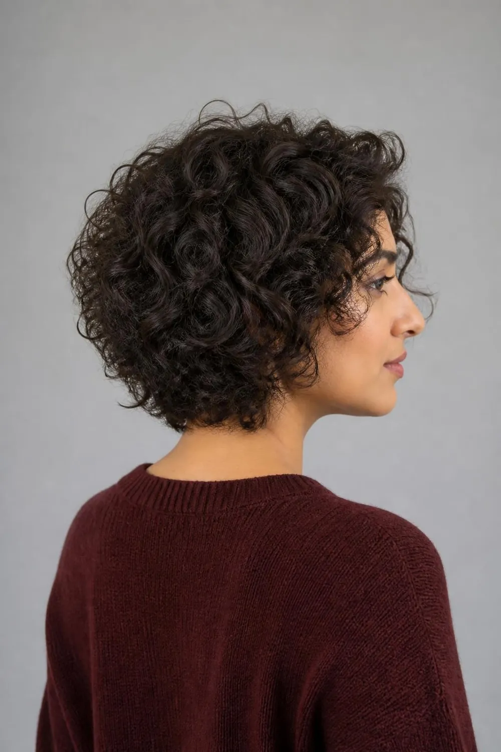 Pyramid-proof curly bob with stacked back layers for thick 3A to 3B curls