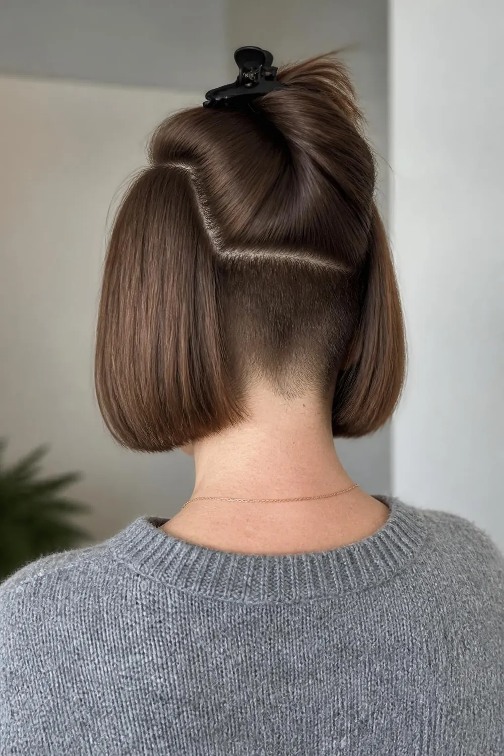 Shaved-nape bob with a hidden undercut at the back for oval faces